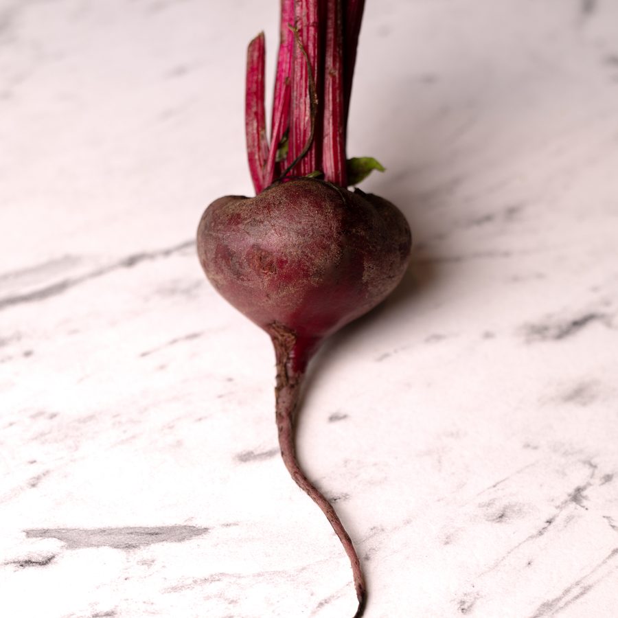 A single beetroot on marble